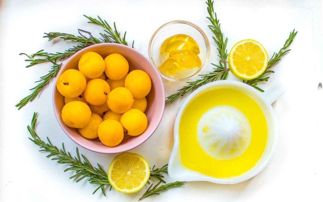 yellow plums, rosemary and lemons to make sour gummies